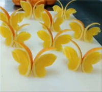 创意水果拼盘装饰(图解),用橙子制成蝴蝶美化拼盘